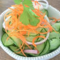 Ar-Jard (Thai Cucumber Salad) · Vegan, gluten free. Cucumber, red onion, carrot, sweet vinaigrette.