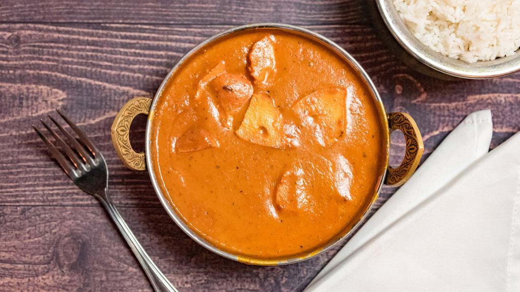 Chicken Tikka Masala · Gluten free. Premium boneless chicken breast cubes cooked in our signature creamy masala sauce with herbs and spices.