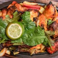 Chicken Tandoori · Gluten free. Your choice of bone in or boneless chicken roasted in the tandoor oven, served ...
