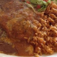 Chile Relleno · Ortega chili stuffed with cheese dipped in egg batter and fried golden brown, smothered with...