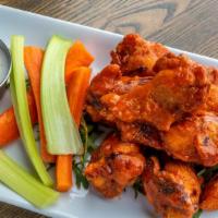 Gulp Chicken Wings · Traditional spicy buffalo sauce or BBQ sauce.