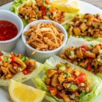 Chicken Lettuce Wrap · Pan seared chicken in citrus juice, cucumbers, red & green onions, bell peppers, chili peppe...