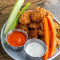 Fried Cauliflower · Flash-fried cauliflower with buffalo sauce, celery & carrot sticks, side of ranch