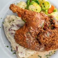 Bone-In Fried Or Bbq Chicken · Served with mashed potatoes & seasonal vegetables, topped with maple bacon gravy.