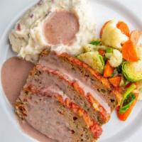 Turkey Meatloaf · Served with cranberry gravy, mashed potatoes, and mixed veggies.