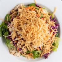 Chinese Chicken Salad · Sake poached chicken, romaine, shredded cabbage, carrots, toasted almonds & apple ginger dre...