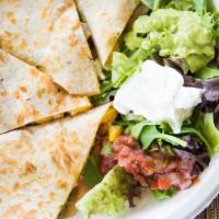 Steak And Mushroom Quesadilla · Grilled steak with sauteed mushrooms, poblano peppers, onions, cilantro, and Jack cheese. Se...