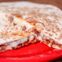 Super Quesadillas · 2 tortillas de harina con carne al gusto, queso chihuahua y guacamole al lado.
2 flour torti...