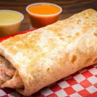 Burrito Regular · Carne al gusto, frijoles, arroz and cebolla y cilantro. 
Your choice of meat, beans, rice, o...