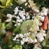 Greek Salad · Romaine lettuce, tomatoes, cucumbers, onions, olives, feta cheese tossed in Greek dressing.