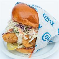 The Fried Chicken Sandwich · House fried chicken, Jack cheese, house slaw, pickles, garlic aioli, fry sauce on a brioche ...