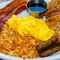 Cody Combo · Two eggs, two sausage, two bacon, two jr. pancakes or French Toast, country potato or hash b...