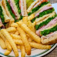 Club Sandwich · Ham, turkey, bacon, lettuce, tomato, and mayo sandwich comes on toasted bread with your choi...