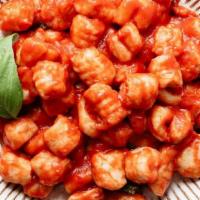 Gnocchi · Potato gnocchi, sautéed with garlic & light creamy marinara sauce.