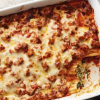 Baked Manicotti · A large tube of fresh pasta stuffed with a blend of soft cheese.