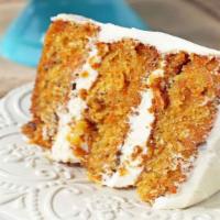 Carrot Cake · Moist cake, spiced with cinnamon and frosted with cream cheese frosting