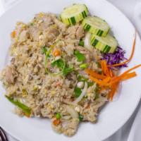Combination Fried Rice · Stir fried steamed rice with eggs, onions, green onions, peas, carrots and sprinkled with sc...
