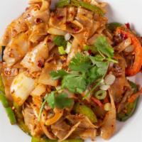 Pad Kee Mao Noodle · Stir fried flat rice noodles with holy basil, sweet peppers, onions and green onions in a ta...