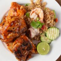 Bbq Combo · Two pieces of BBQ chicken and two pieces of BBQ pork ribs marinated in house special BBQ sau...