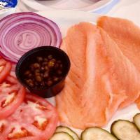 Smoked Salmon & Bagel Breakfast · Served with capers, onions, tomatoes, cucumbers, and cream cheese.