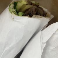 Carne · 100% fresh, hand-shredded beef, tomatoes, lettuce, onions, cucumber, and pickles.
