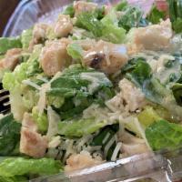 Caesar Salad · Romaine lettuce, Parmesan, croutons, and Caesar dressing.