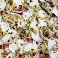 Chicken Alfredo Pizza · Housemade creamy garlic sauce, oven roasted chicken breast, smoked bacon, red onion, and moz...