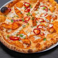 Buffalo Chicken Pizza · Housemade ranch base, chicken breast tossed in Housemade Buffalo sauce, red onion, fresno ch...