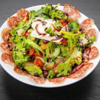 The Italian Salad · Seasonal greens, romaine lettuce, Neapolitan salami, bell peppers grape tomatoes, cucumbers,...