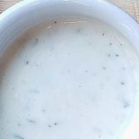 Housemade Ranch · Creamy Housemade ranch dressing with a hint of dill and garlic.