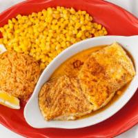 Pescado Al Mojo De Ajo · Succulent halibut sautéed in garlic and butter. Served with rice, sweet corn and  tortillas.
