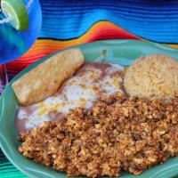 Huevos Con Chorizo · Two eggs scrambled with Mexican pork sausage. Served with rice and beans.