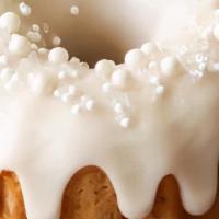 Vanilla Bundt Cake  · vanilla bundt cake with our semi sweet vanilla buttercream topped with a white chocolate hea...