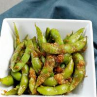 Steamed Edamame · edamame tossed in sea salt.