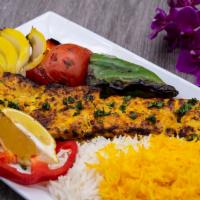 Chicken Barg · Marinated boneless chicken breast, served with basmati rice, grilled tomato, onions and gree...