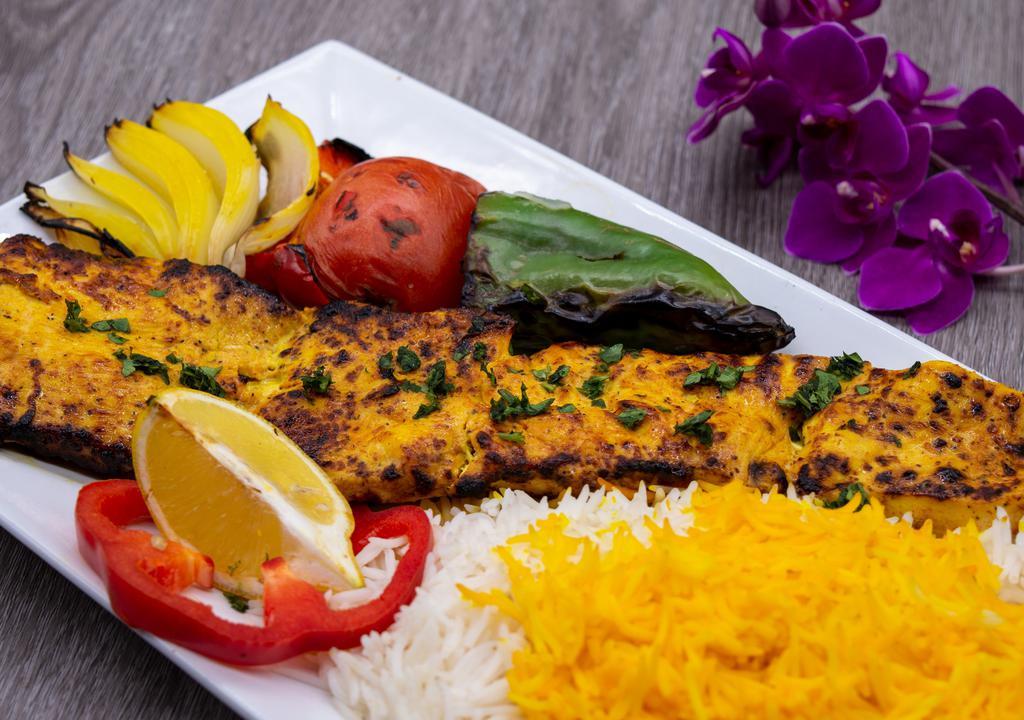 Chicken Barg · Marinated boneless chicken breast, served with basmati rice, grilled tomato, onions and green pepper.