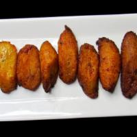 Platano Fritos · Fried plantains.