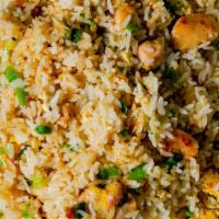 Arroz Chaufa De Casa / Chaufa Rice From Home · Camarones, carne de res y de pollo al estilo peruano, arroz frito, cebollas, piezas de huevo...