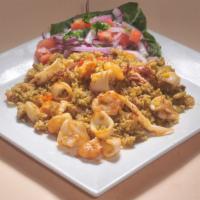 Arroz Con Mariscos / Rice With Shrimp  · Paella al estilo peruano, arroz amarillo y mariscos. / Peruvian style paella, seafood yellow...