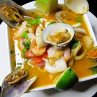 Parihuela · Peruvian bouillabaisse. Seafood soup fish, shrimp, and squid in a tomato broth.