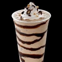 Milkshake · A smooth, creamy frozen dessert made with your choice of ice cream flavor and topped with wh...