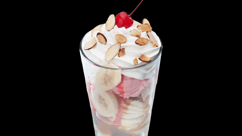 Upright Banana Split · The classic banana split dessert has broken tradition and gone vertical for a flavorful delight with a cherry on top! .