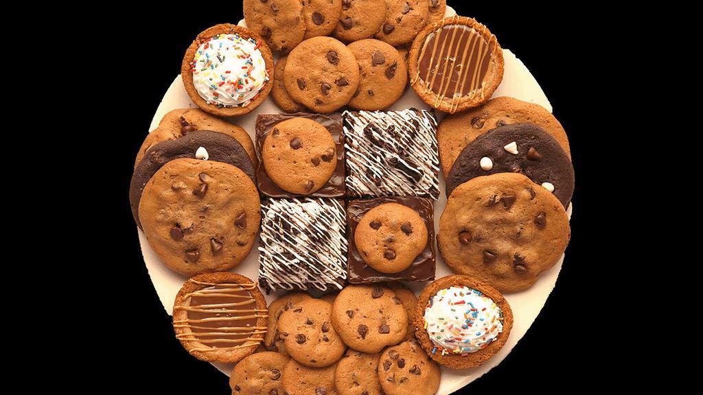 Toll House Party Platter · This platter brings the party!  Includes:.       6 Classic Cookies.     24 Chocolate Chip Mini Cookies.       4 Specialty Brownies (assorted).       4 Specialty Cookie Cups (assorted)