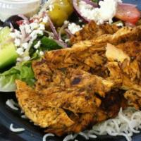 Chicken Gyro Plate · Specially marinated charbroiled chicken breast, thinly sliced and cooked to perfection. Incl...