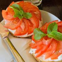 Bagel + Cream Cheese +Tomatos · Bagels: 'everything'  bagel only available
*BAGELS ARE TOASTED UNLESS SPECIFIED*