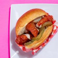 Spicy Fried Chicken Sandwich · Cajun seasonings, ranch, and pickles on a toasted brioche bun.