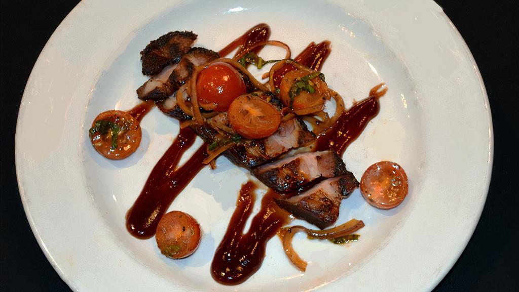 Nueske'S Pork Belly · Smoked Aged Pork Belly Medallions, Sweet Barbeque Glaze, Tomato Relish.