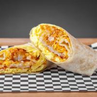 Classic Breakfast Burrito · Flour tortilla with scrambled eggs, breakfast potatoes and cheddar cheese.