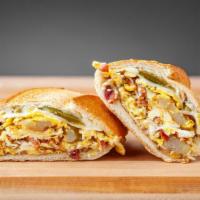 Bacon Breakfast Sandwich · Freshly baked bread with bacon, scrambled eggs, queso fresco, jalapeno and mayonnaise.