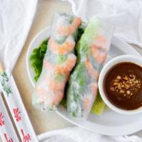 Shrimp Spring Rolls (2) · Shrimp, salad, mint leaf, vermicelli noodle, rice paper wrapping with peanut sauce.
